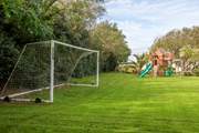 Complete with football goals.