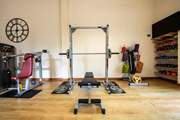 The gym is exclusive to holiday guests and has a squat rack, free weights and machines.