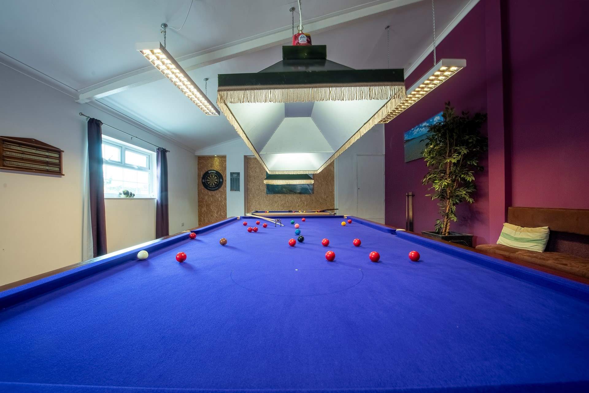 The full-size snooker-table in the pool-room.