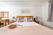 The king-size bedroom is gorgeous.
