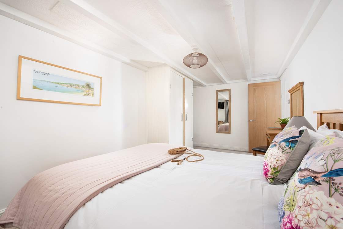 It has two steps down to its innovative en suite.