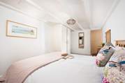 It has two steps down to its innovative en suite.