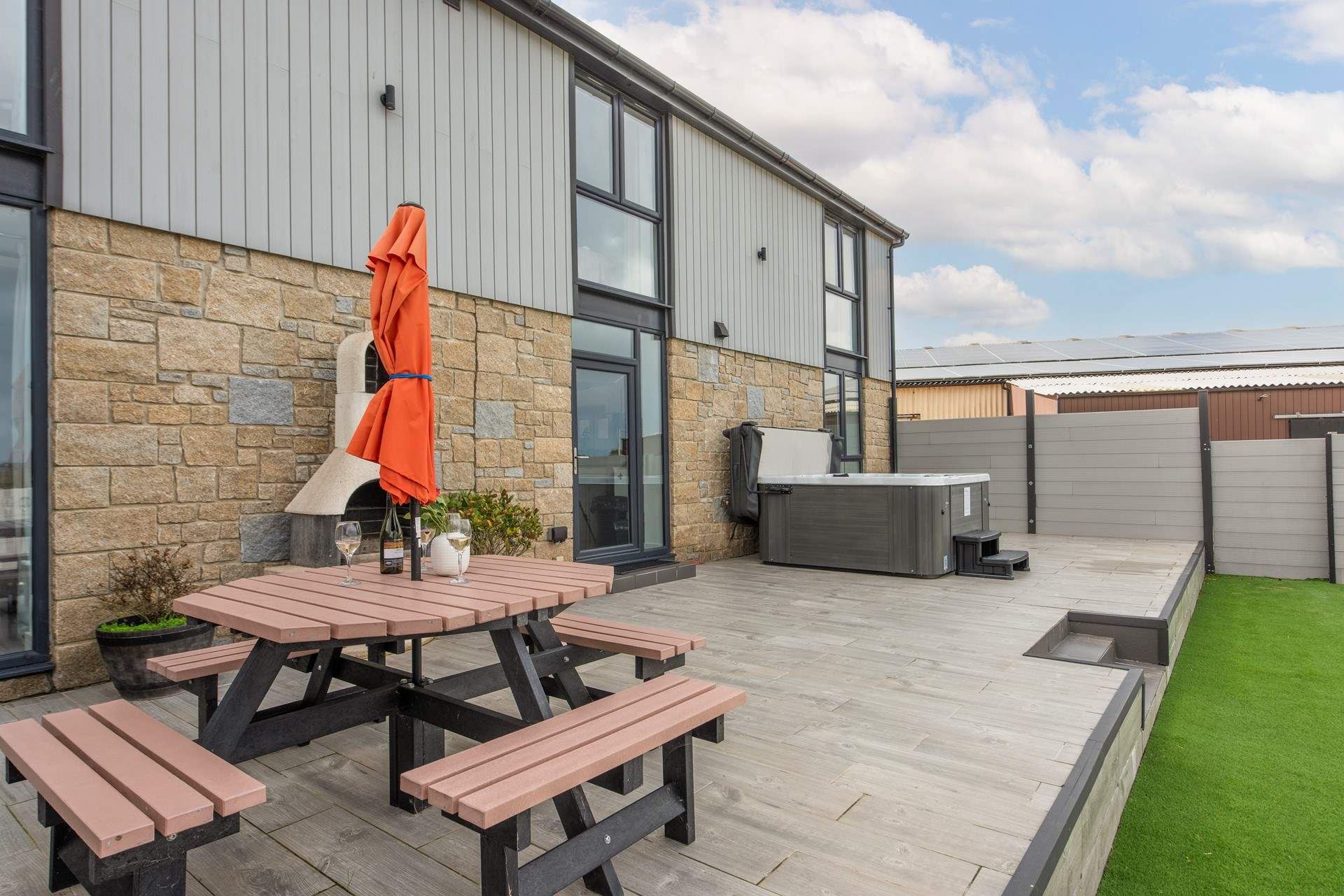 Your private hot tub and garden space overlooks the valley.
