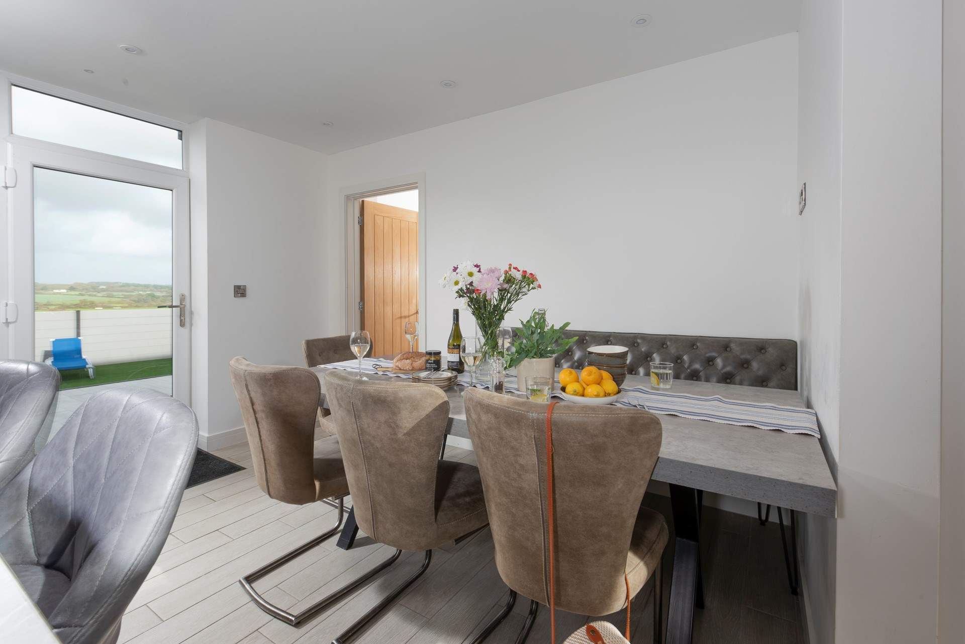 The dining space is perfect for breakfast and planning the days ahead.