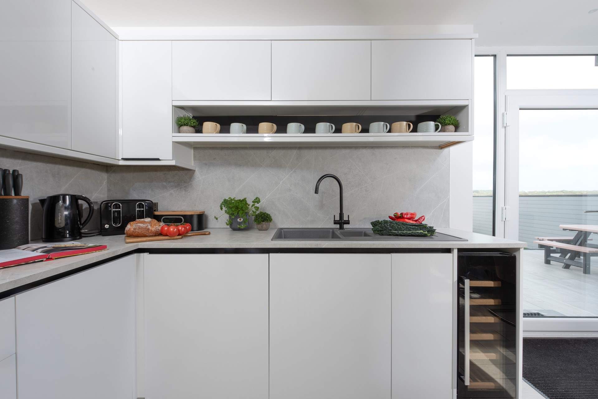 Beautifully appointed complete with wine cooler.