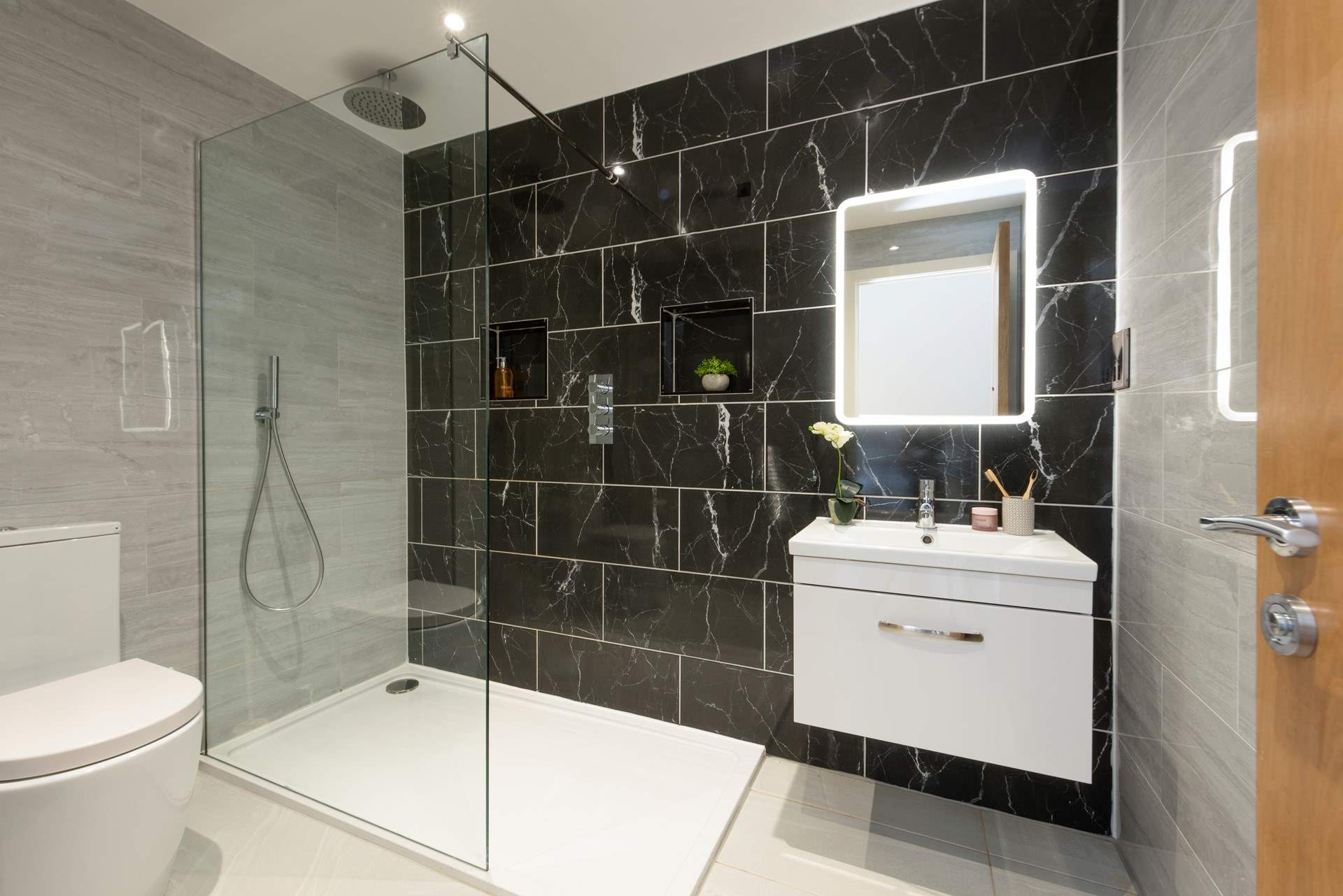 The en suite shower-room to the pink room.