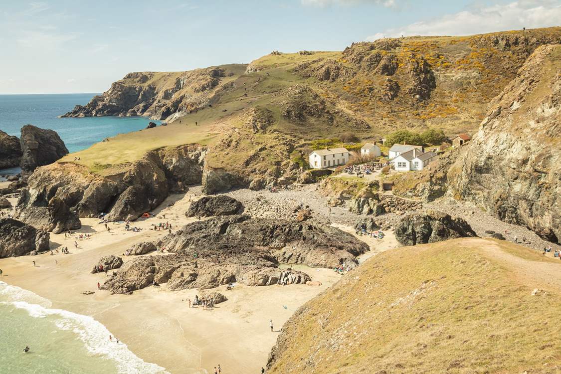 White sands and azure blue seas great you at Kynance Cove, owned by the National Trust.