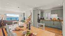 The open plan design of the first floor living areas makes cooking, dining and relaxing a very sociable event. 