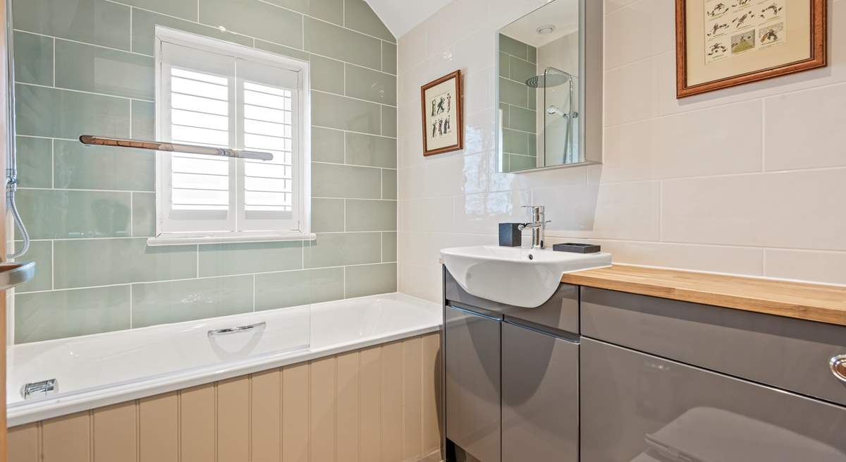 Bedroom 3 is treated to an en suite bathroom.