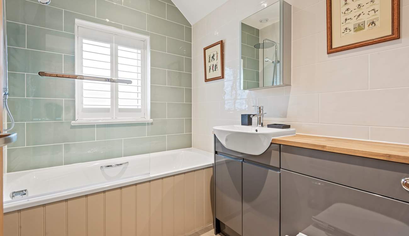 Bedroom 3 is treated to an en suite bathroom.