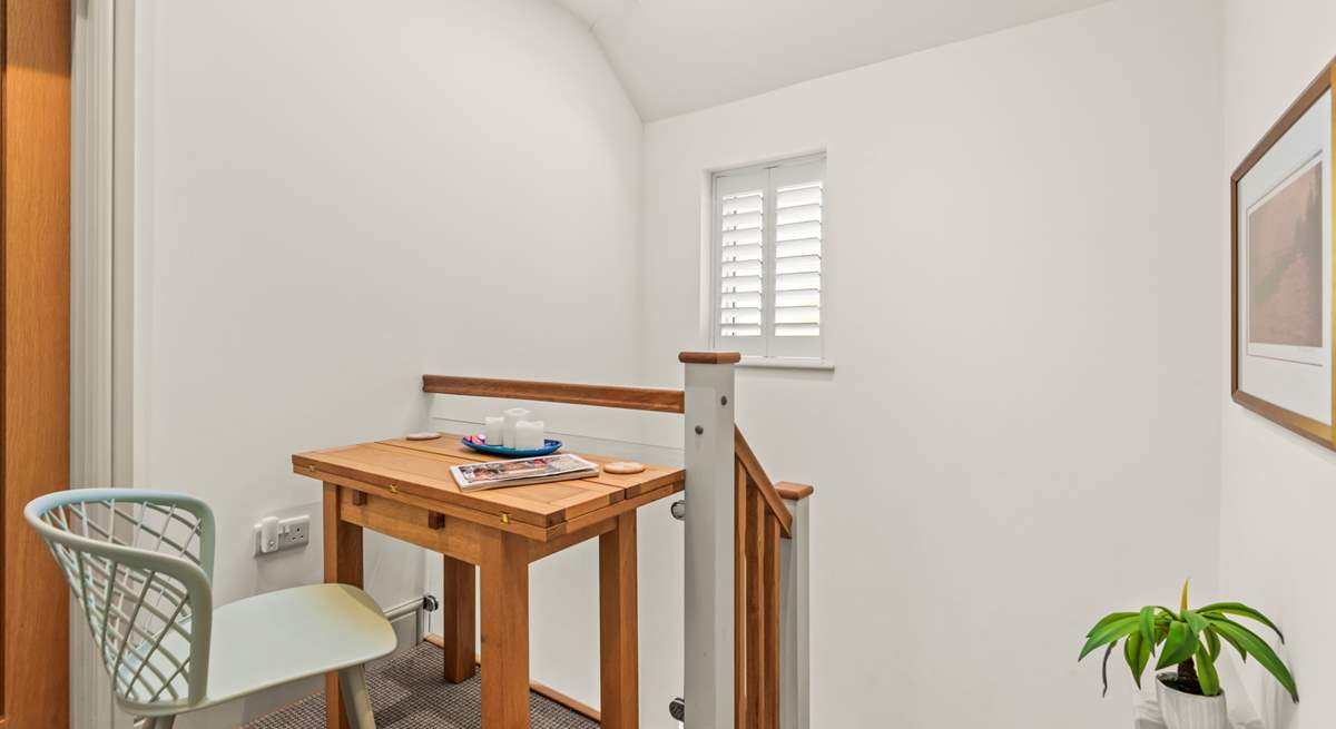 The hallway links both bedroom 2 and bedroom 3 on the second floor. It also offers a nice space to send those important emails.