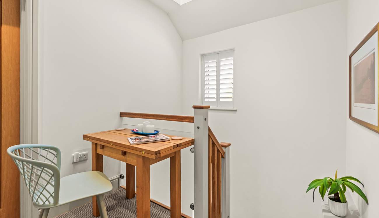 The hallway links both bedroom 2 and bedroom 3 on the second floor. It also offers a nice space to send those important emails.