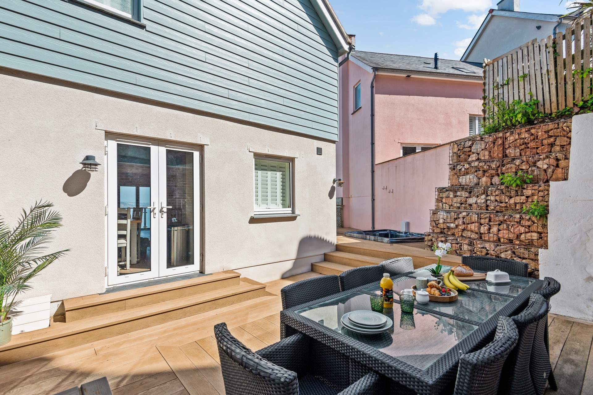 What a lovely spot for a  touch of dining alfresco.