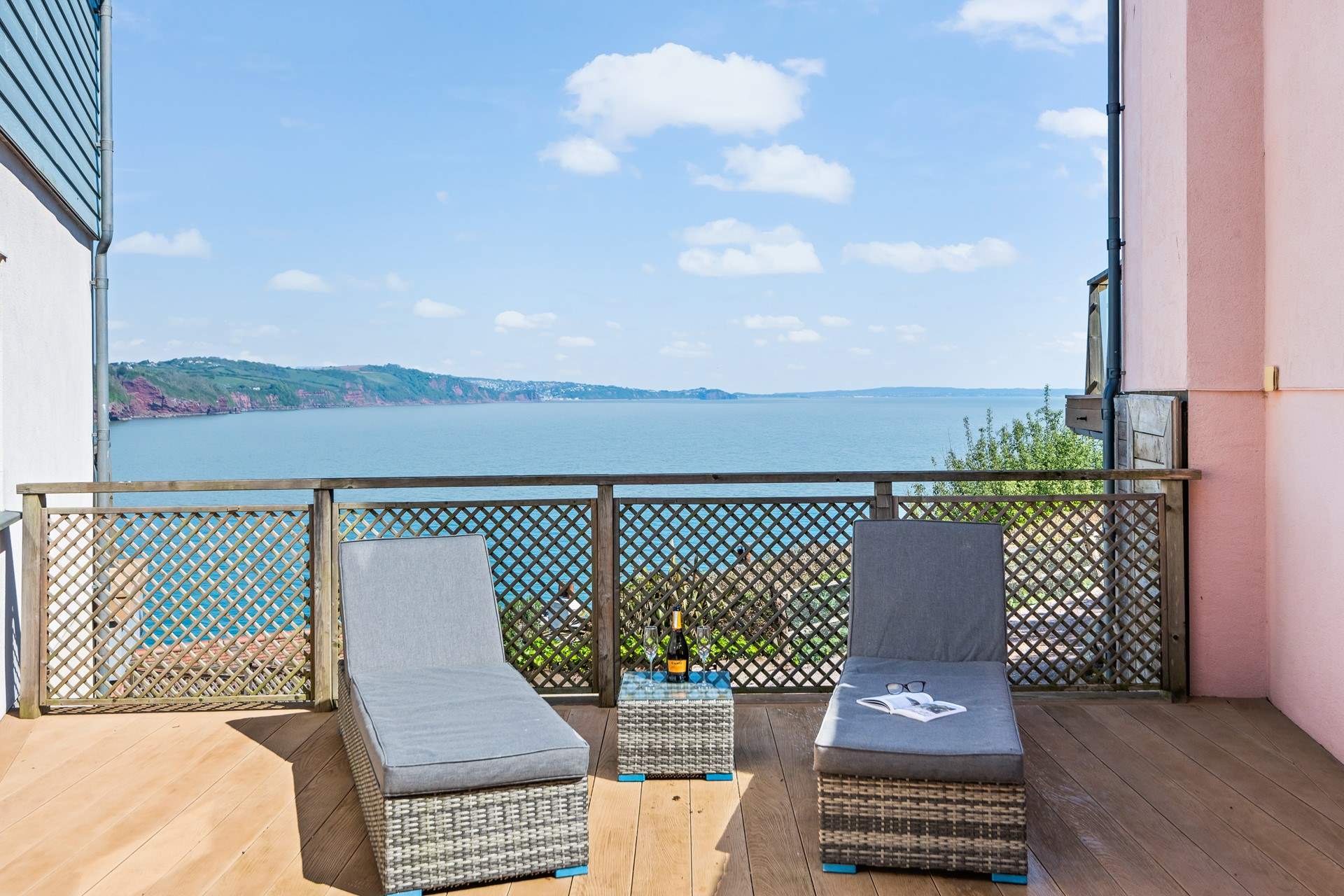 Relaxing with a glass of something bubbly with the glorious English Riviera behind you. Perfect!