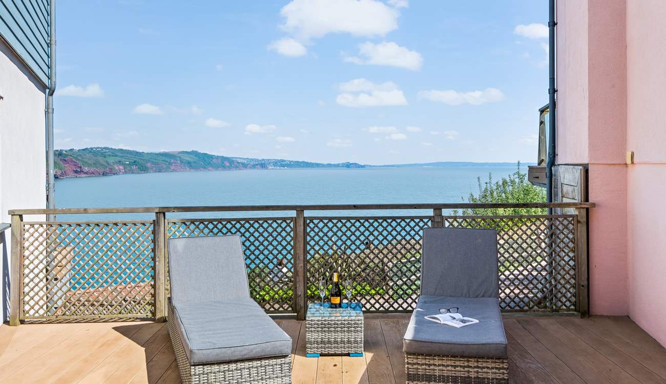 Relaxing with a glass of something bubbly with the glorious English Riviera behind you. Perfect!