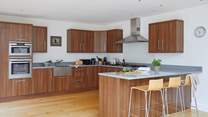 The sociable kitchen is equipped with all you need to cook up a family feast.