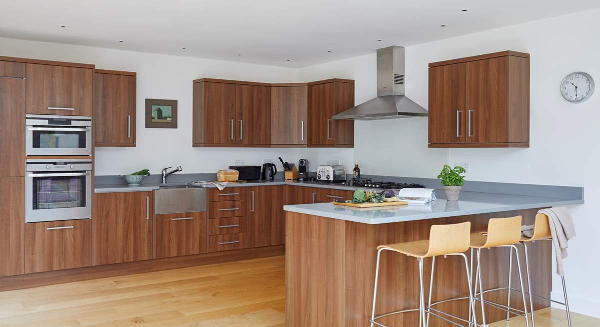 The sociable kitchen is equipped with all you need to cook up a family feast.