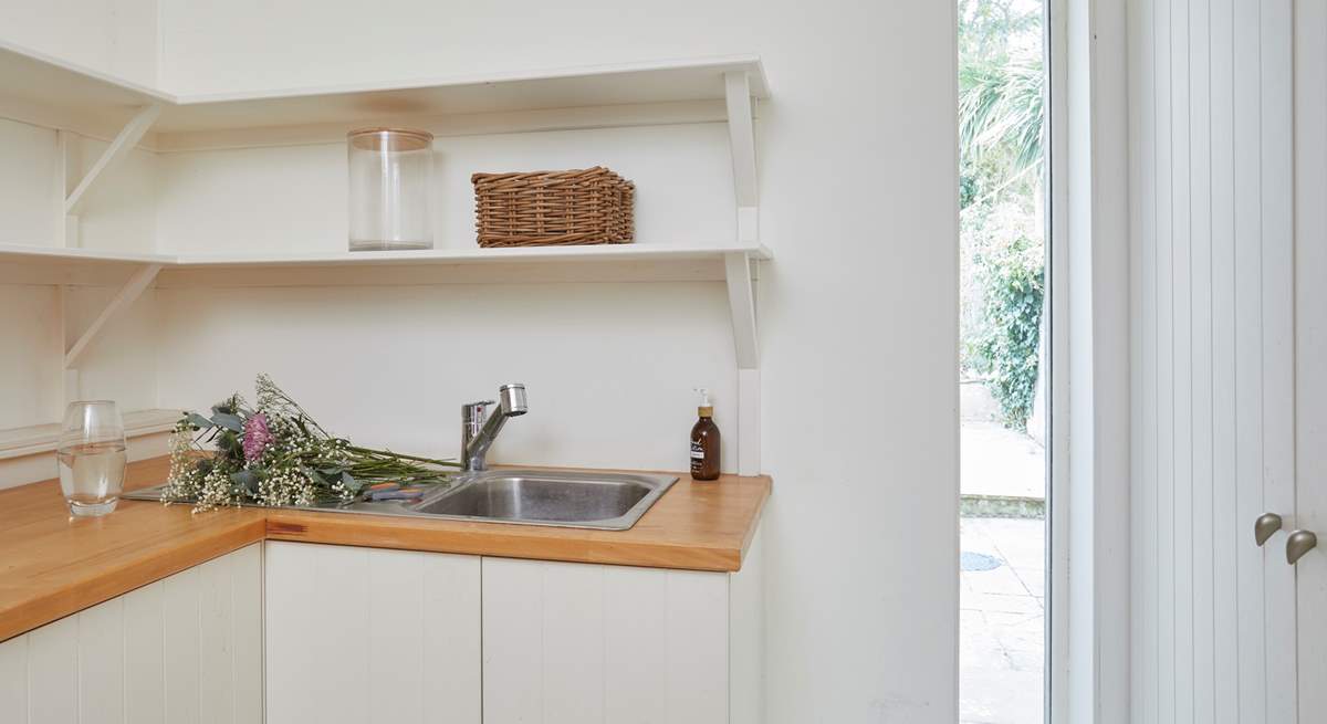 The utility-room is great for storing wet beach wear and sandy toys.There is also a washing machine and tumble-drier which may come in handy!