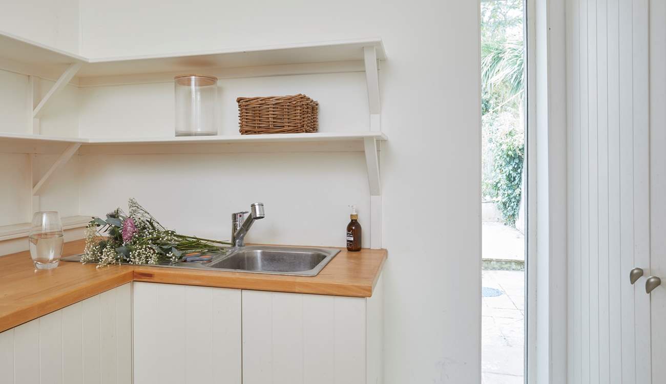 The utility-room is great for storing wet beach wear and sandy toys.There is also a washing machine and tumble-drier which may come in handy!