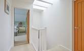 The first floor landing is light and airy thanks to the skylight. - Thumbnail Image