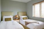 Bedroom 1 with comfortable twin beds, perfect for children or adults...