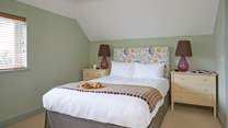 Bedroom 4 has its own en suite bathroom with separate shower.