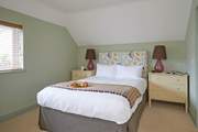 Bedroom 4 has has its own en suite bathroom with separate shower.