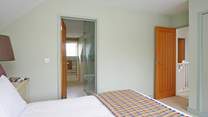Bedroom 4 with king-size bed.