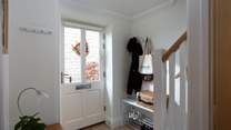 Boots and coats have a home in the entrance hall. 