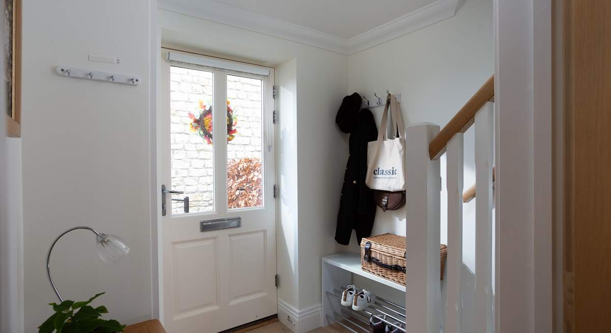 Boots and coats have a home in the entrance hall. 