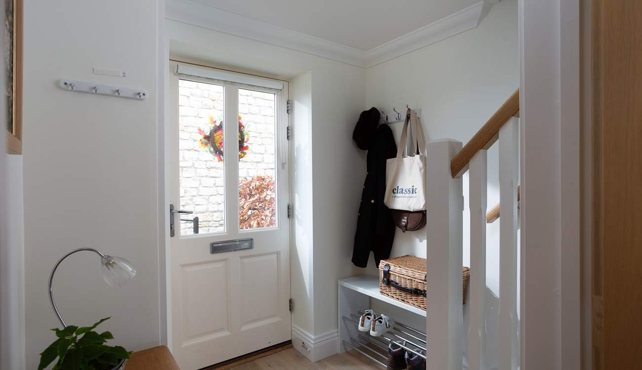 Boots and coats have a home in the entrance hall. 