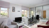 Work from home, watch TV, play a game of chess...the choice is yours. 