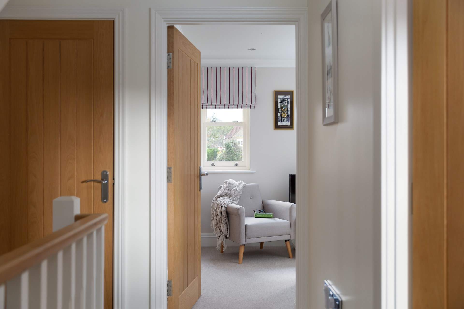 The hallway leads to the snug.