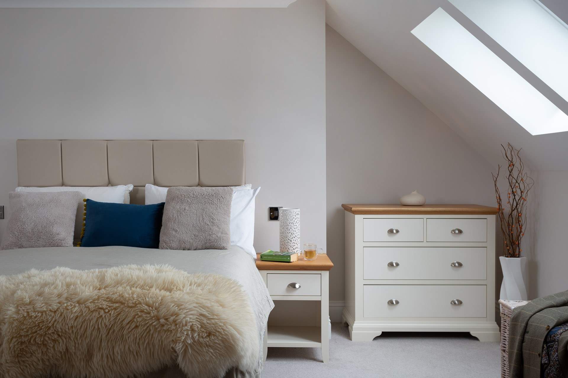 Sunlight streams in through the Velux window.