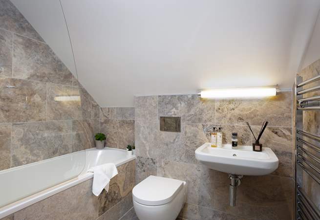 Soak in the bath (which has a shower over) and dream of tomorrow's adventures.