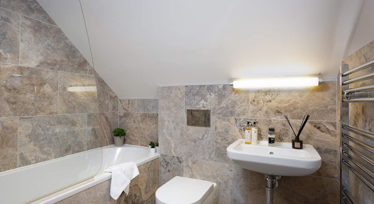 Soak in the bath (which has a shower over) and dream of tomorrow's adventures.