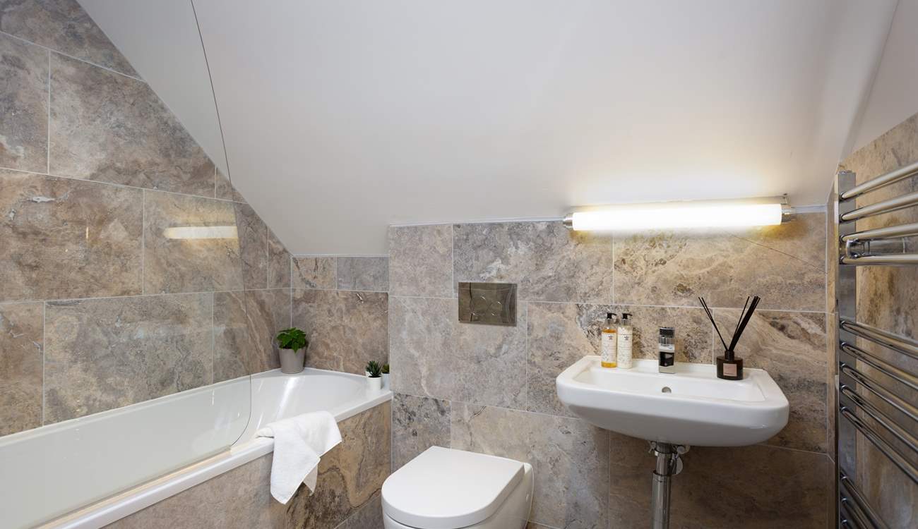 Soak in the bath (which has a shower over) and dream of tomorrow's adventures.