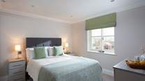 The double bedroom on the first floor is a relaxing space.