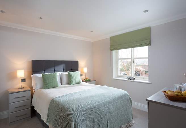 The double bedroom on the first floor is a relaxing space.