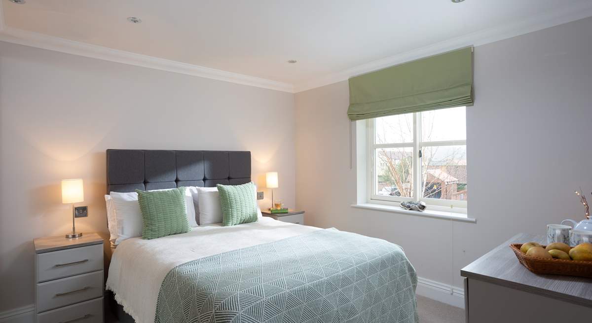 The double bedroom on the first floor is a relaxing space.