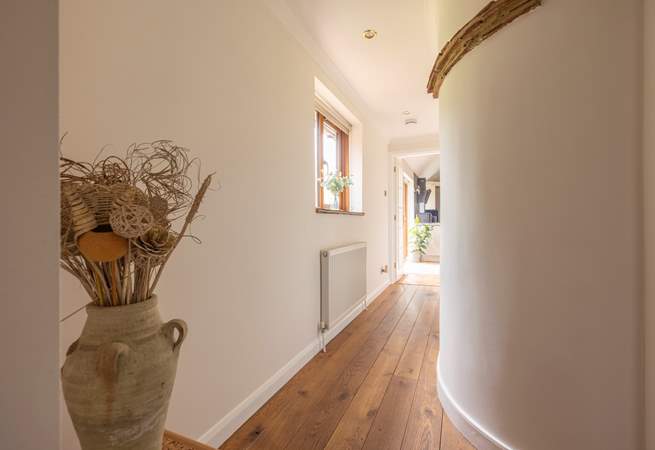 The hallway from the bedrooms and family bathroom lead to the open plan living area.
