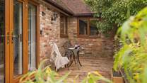 Double doors from the private decking lead into Pomona Annexe.