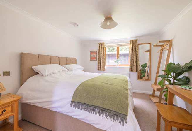 The beds are dressed in crisp white linen for that extra touch of luxury.