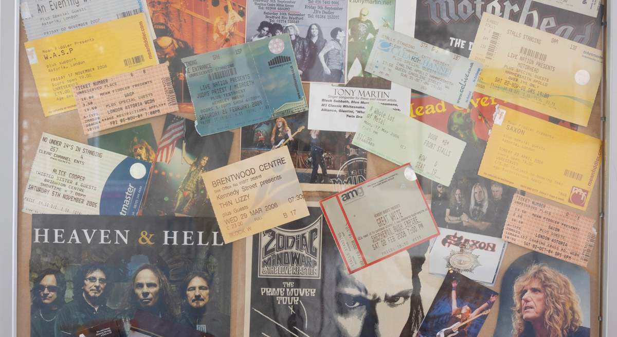 The walls around the games-area are adorned with rock memorabilia.