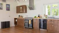 The kitchen is a chef's dream with plenty of space to prepare a lazy brunch or holiday feast.