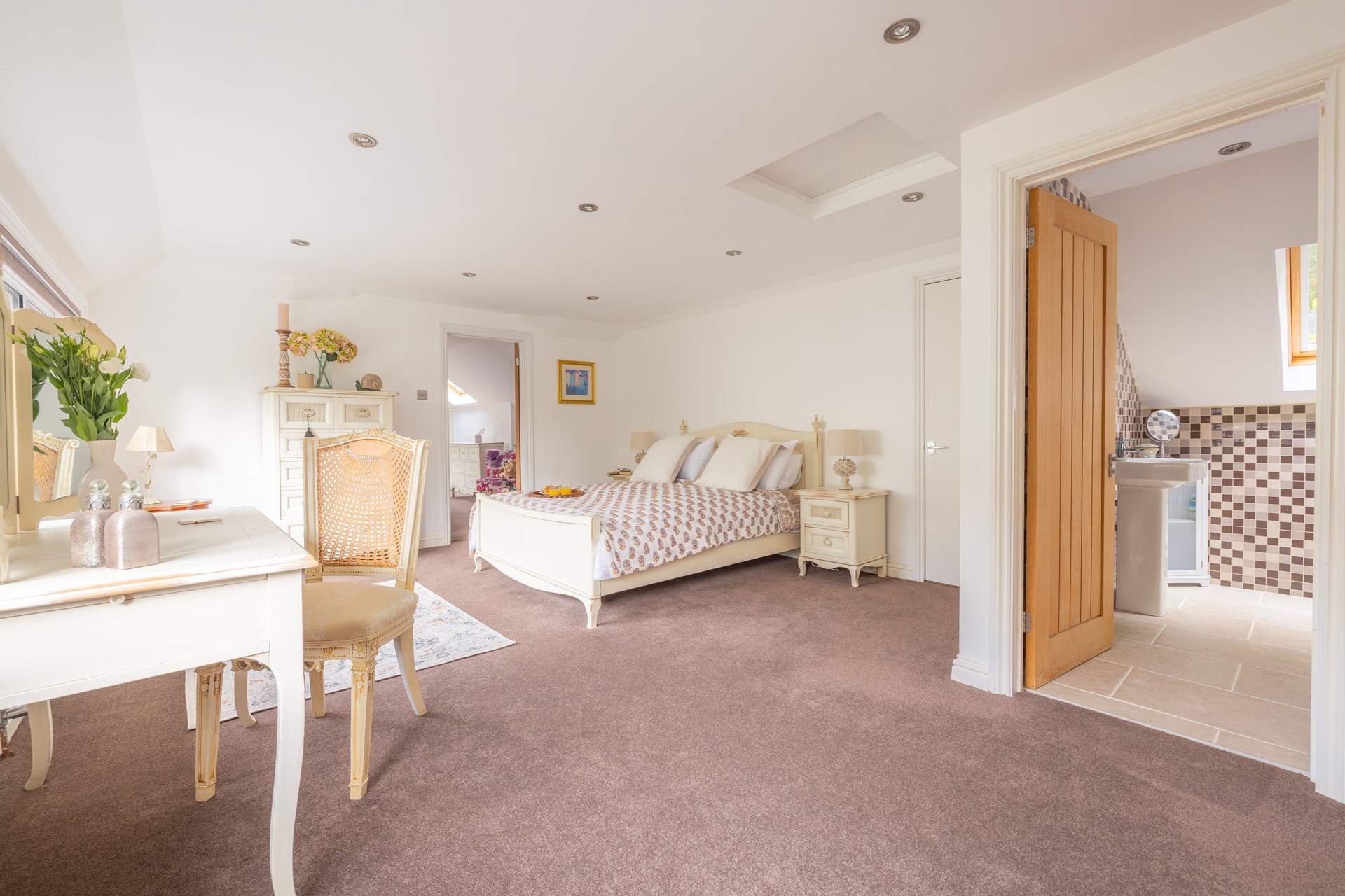 This king-size double has an en suite bathroom and an interconnecting door leading to the twin room.