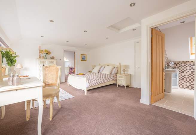 This king-size double has an en suite bathroom and an interconnecting door leading to the twin room.