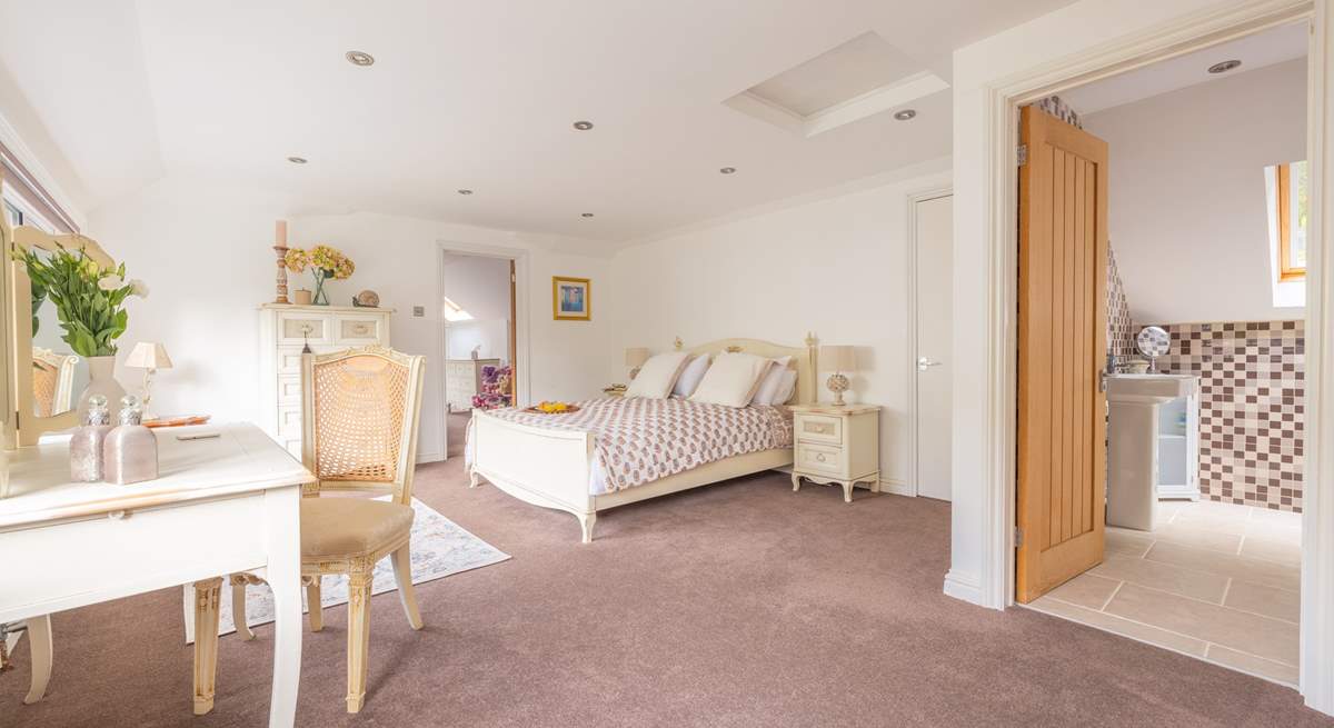 This king-size double has an en suite bathroom and an interconnecting door leading to the twin room.