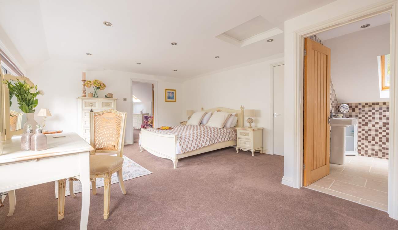 This king-size double has an en suite bathroom and an interconnecting door leading to the twin room.