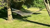 Stretch out on the hammock with a good book.